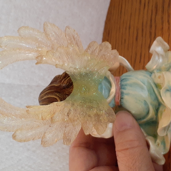 Pretty Angel holding a baby - Picture 3 of 4